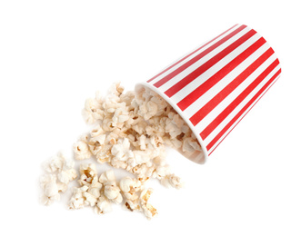 Bucket of tasty pop corn isolated on white, top view