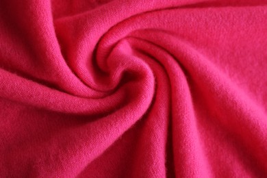 Photo of Beautiful pink fabric as background, top view