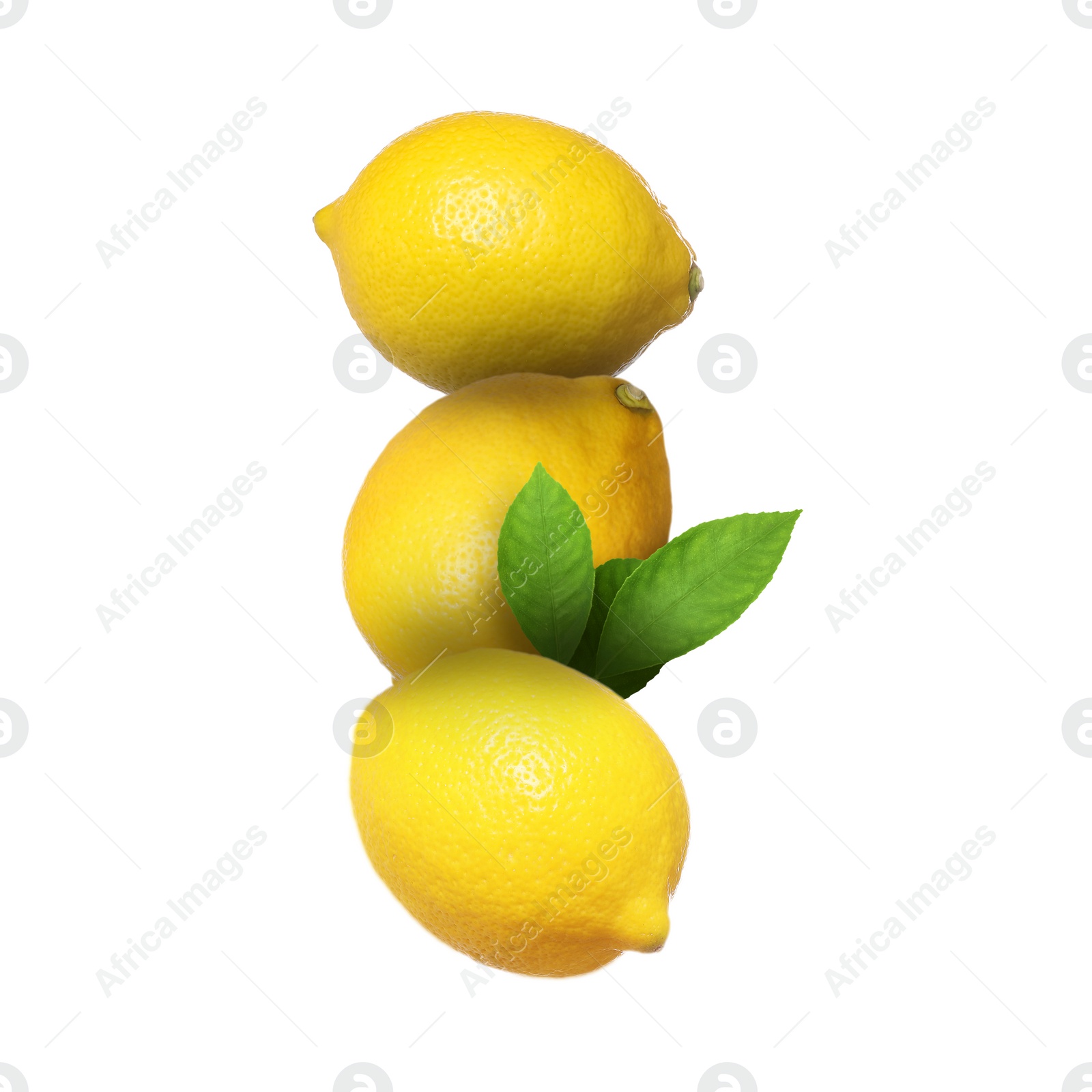 Image of Whole fresh lemons with green leaves isolated on white