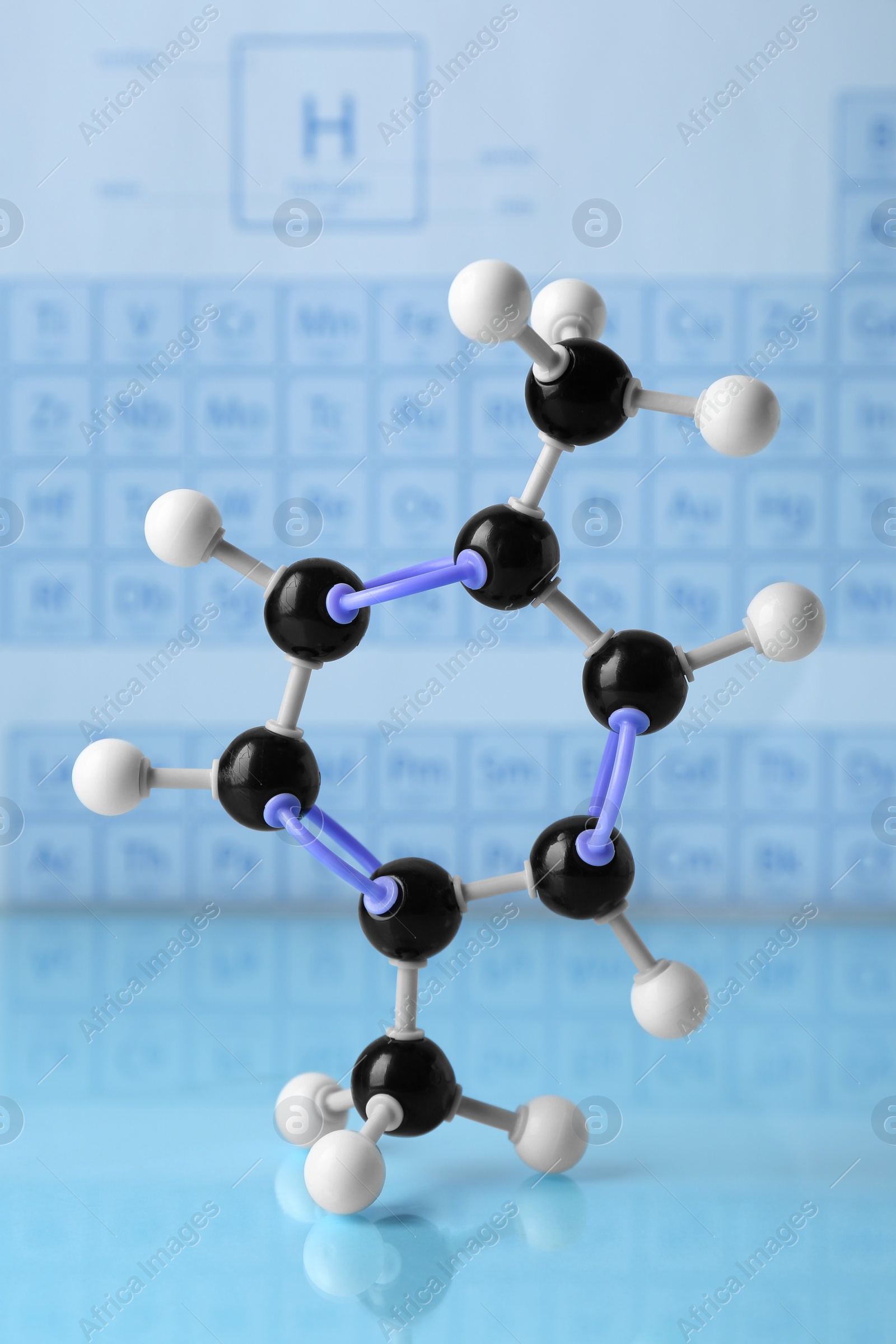 Photo of Molecular model on light surface against blurred background