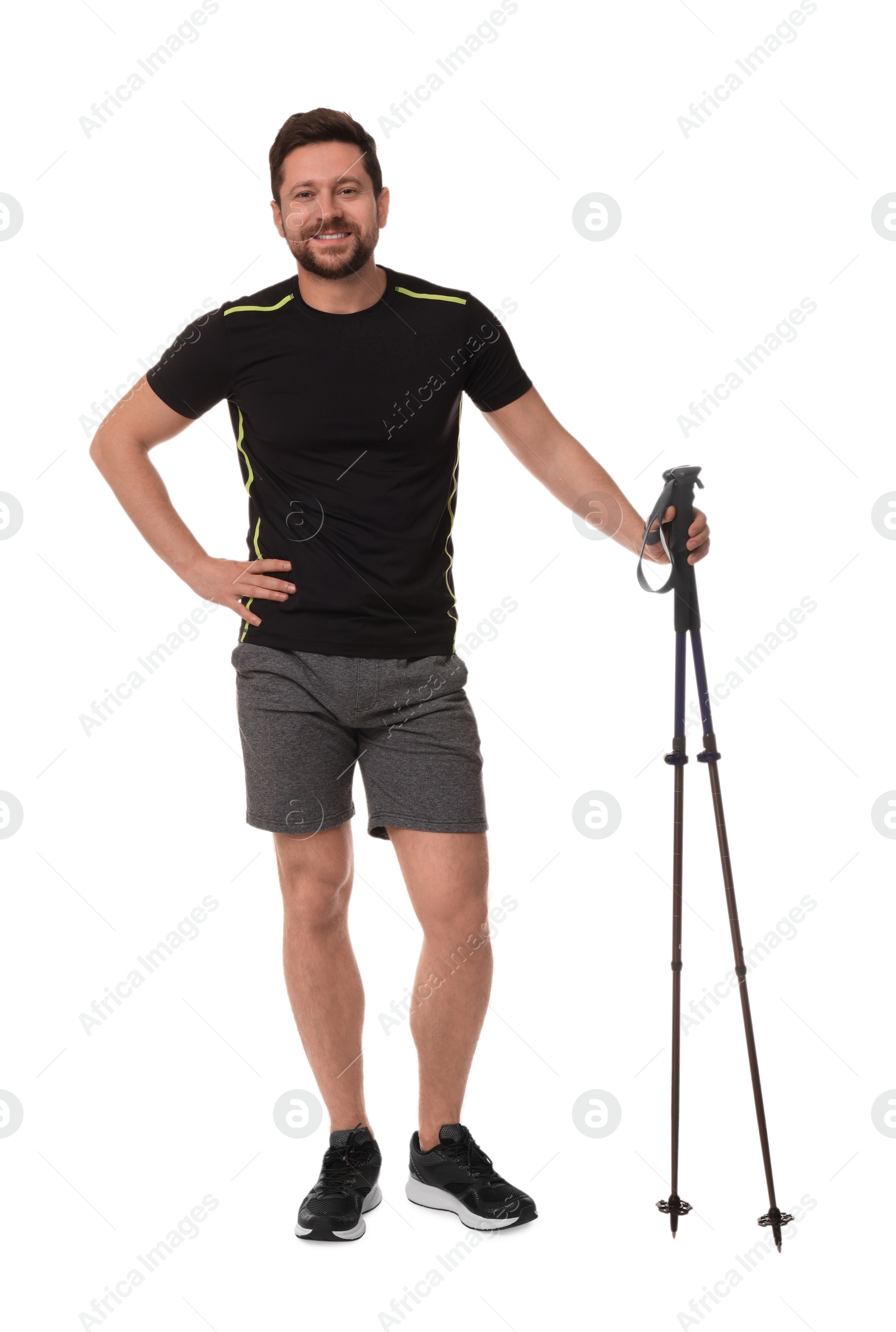 Photo of Man with poles for Nordic walking isolated on white