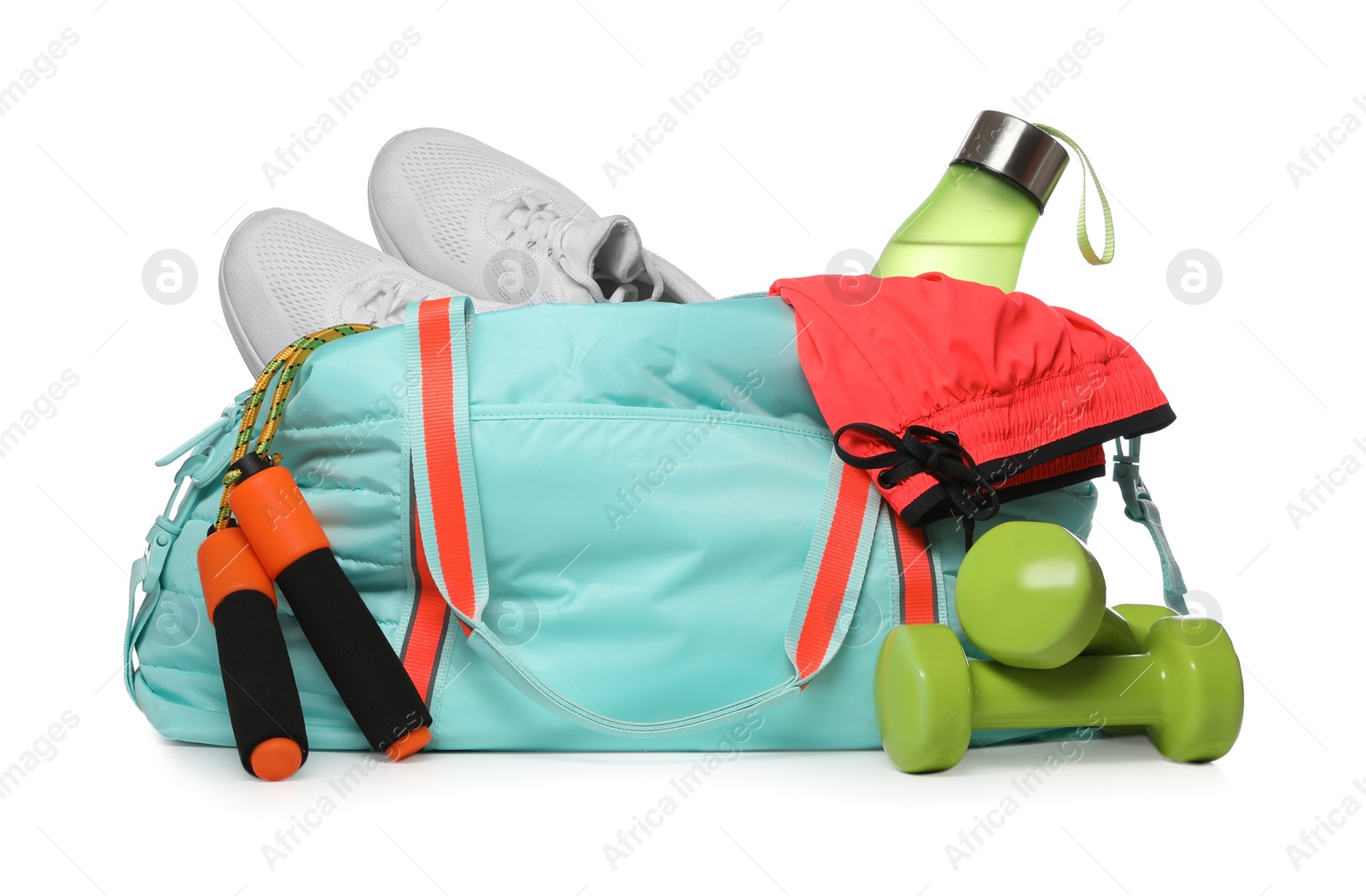 Photo of Bag with different sports equipment on white background