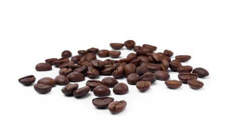 Photo of Fresh roasted coffee beans on white background