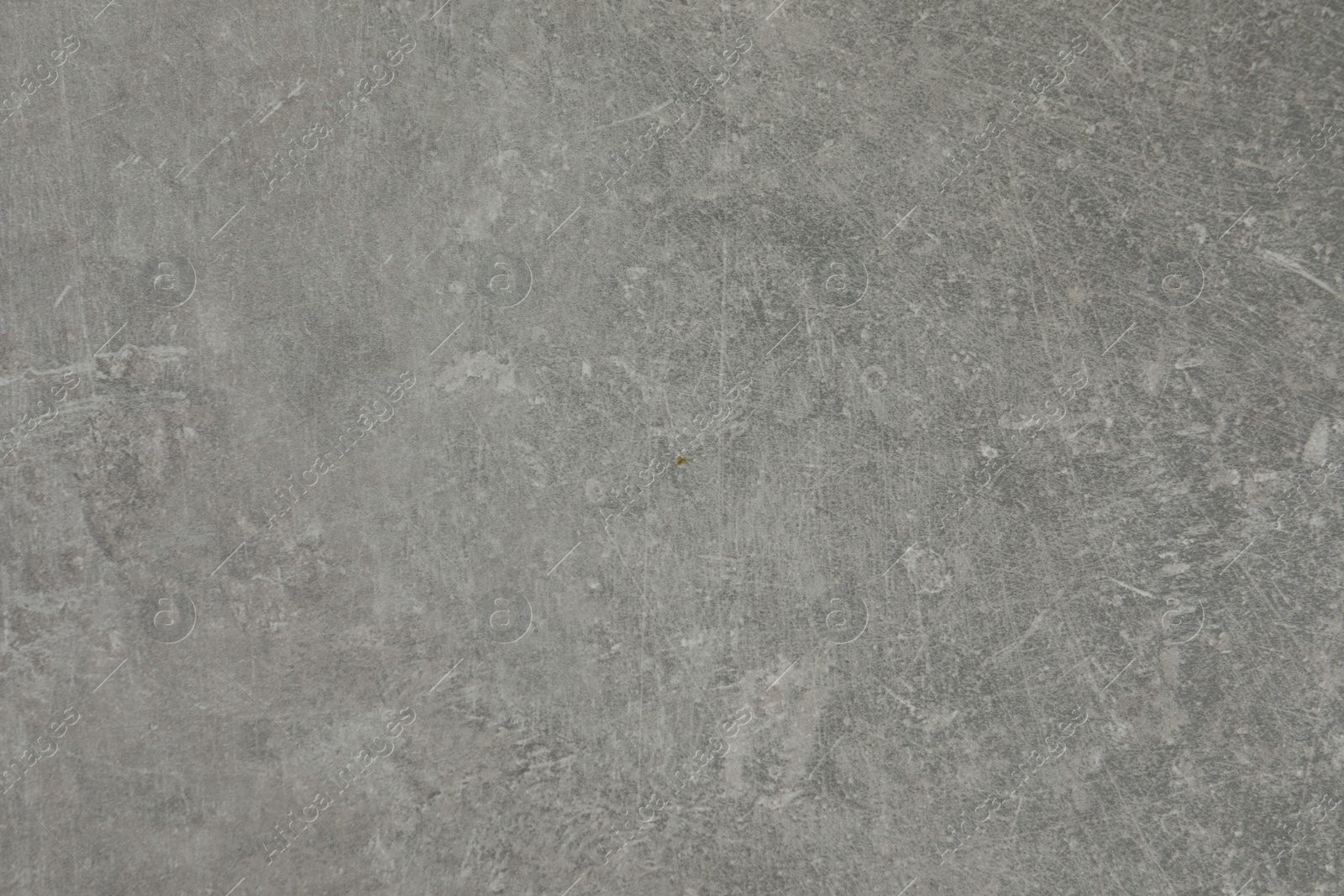 Photo of Texture of grey stone surface as background, closeup