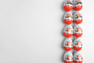 Sveti Vlas, Bulgaria - June 26, 2023: Kinder Surprise Eggs on white background, flat lay. Space for text
