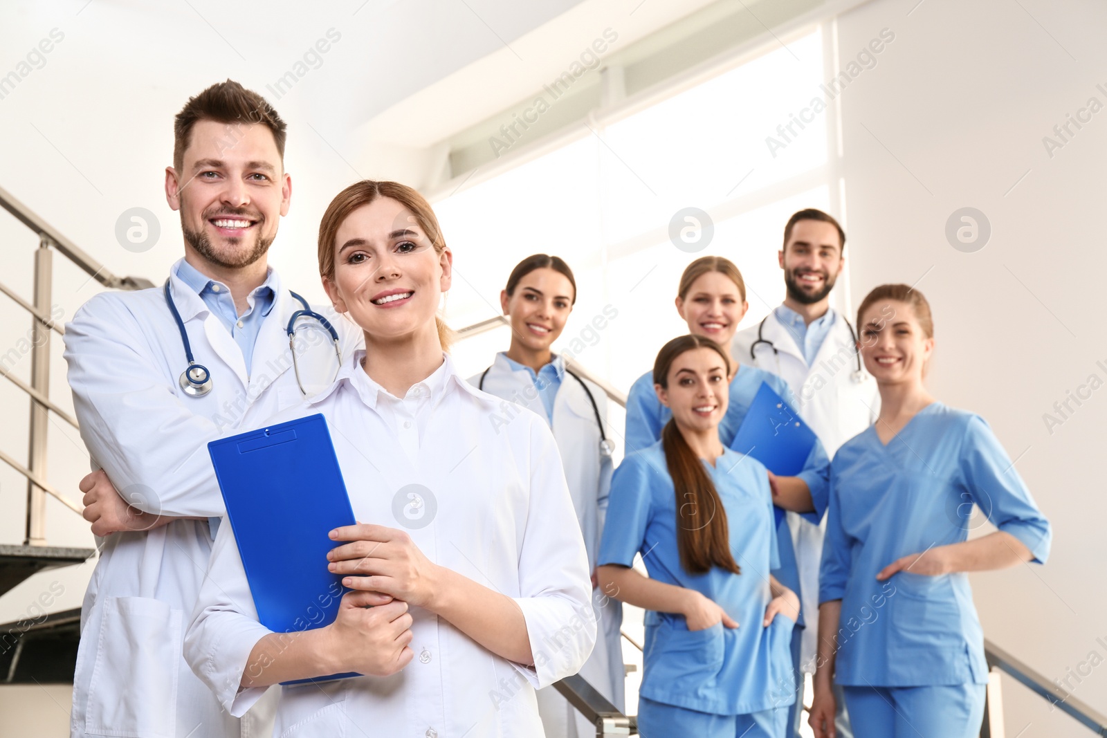 Photo of Group of medical doctors at clinic. Unity concept
