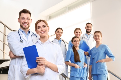 Photo of Group of medical doctors at clinic. Unity concept