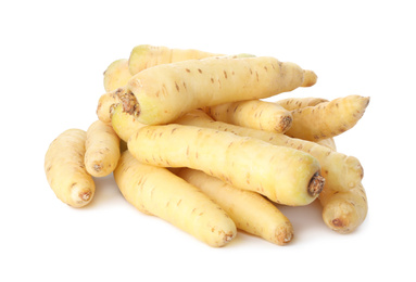 Photo of Whole fresh raw carrots isolated on white