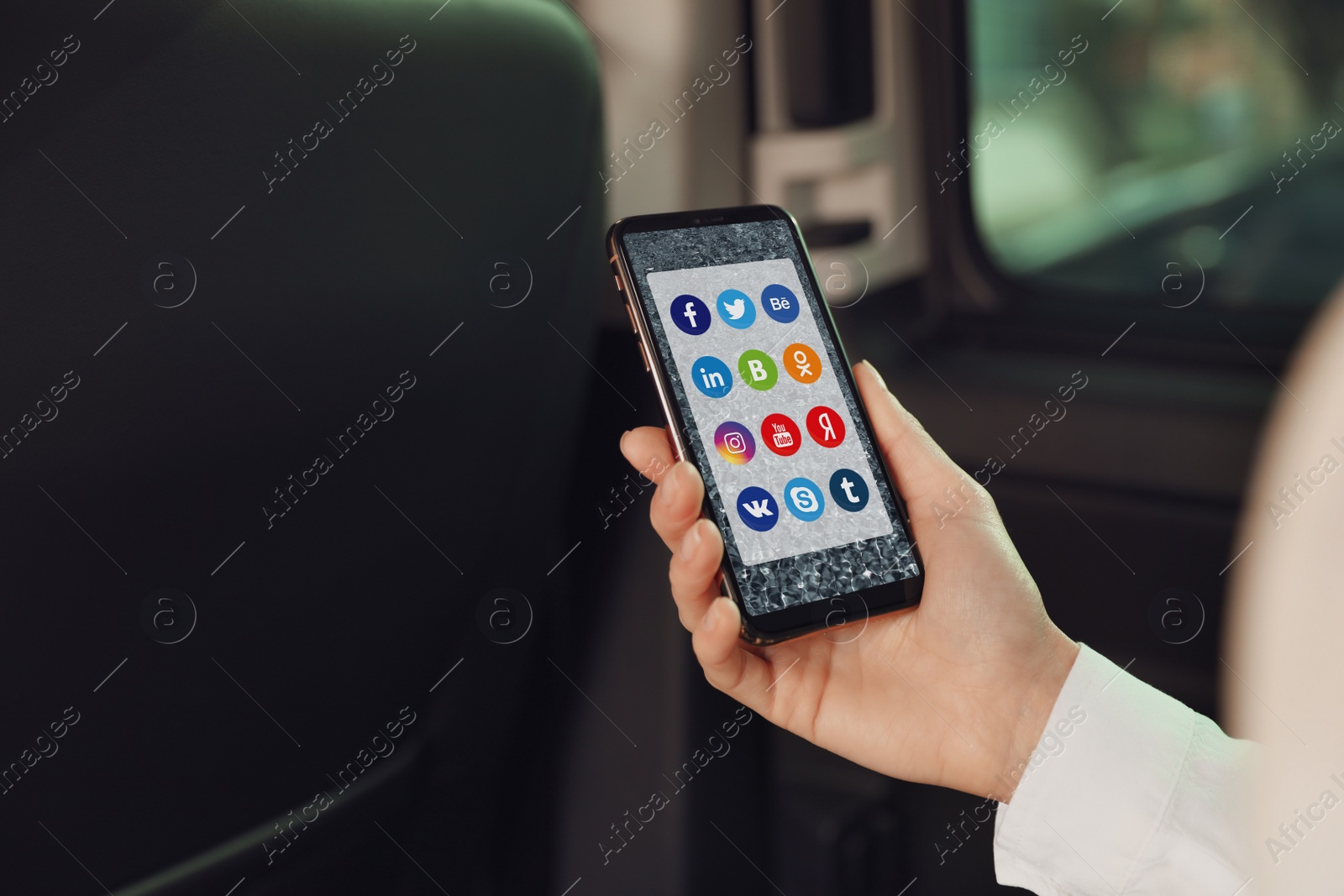 Image of MYKOLAIV, UKRAINE - APRIL 30, 2020: Woman holding phone with social media apps icons on screen, closeup