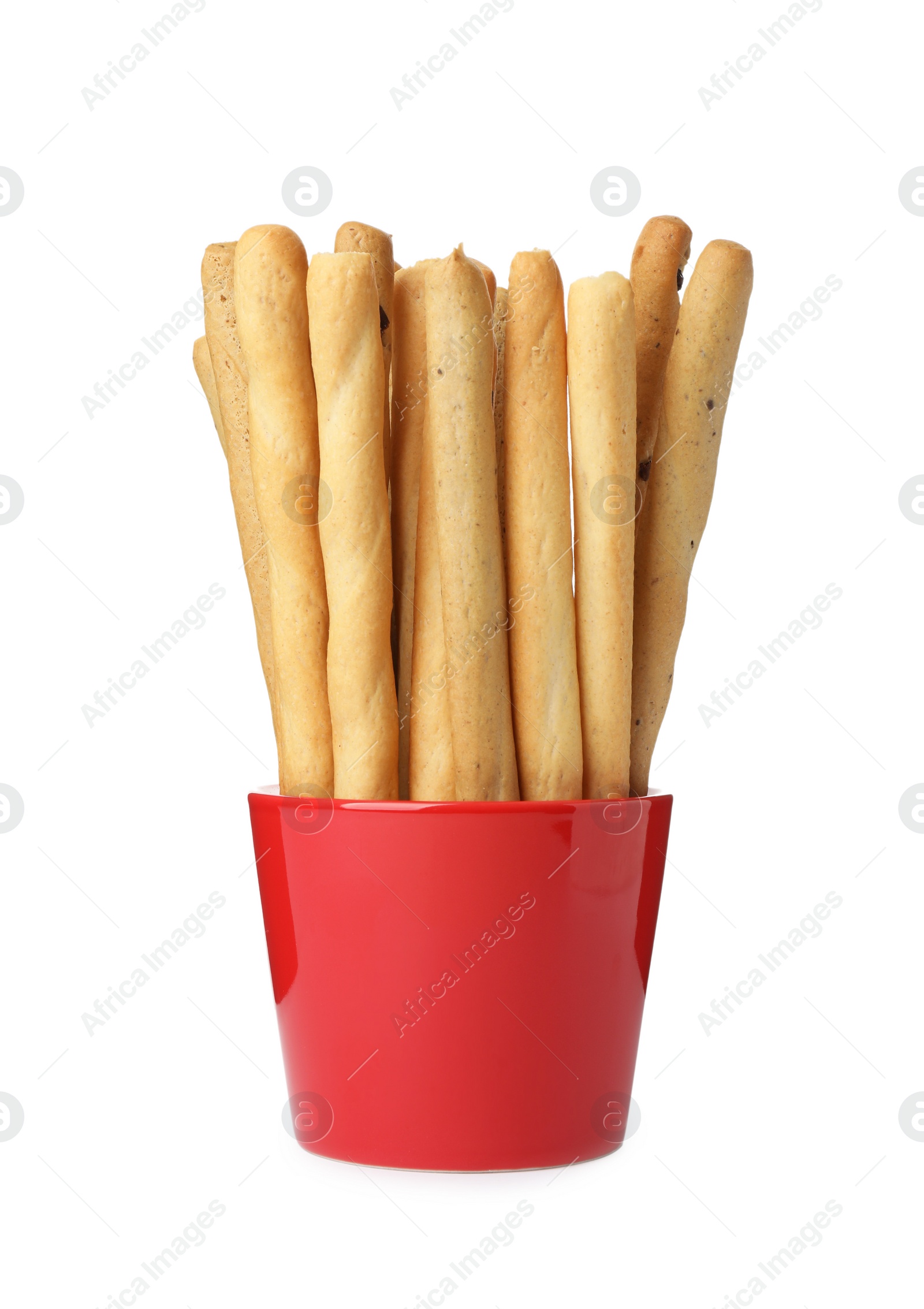 Photo of Delicious grissini sticks in cup on white background