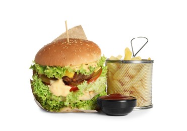 Photo of Burger with delicious patty, french fries and sauce isolated on white