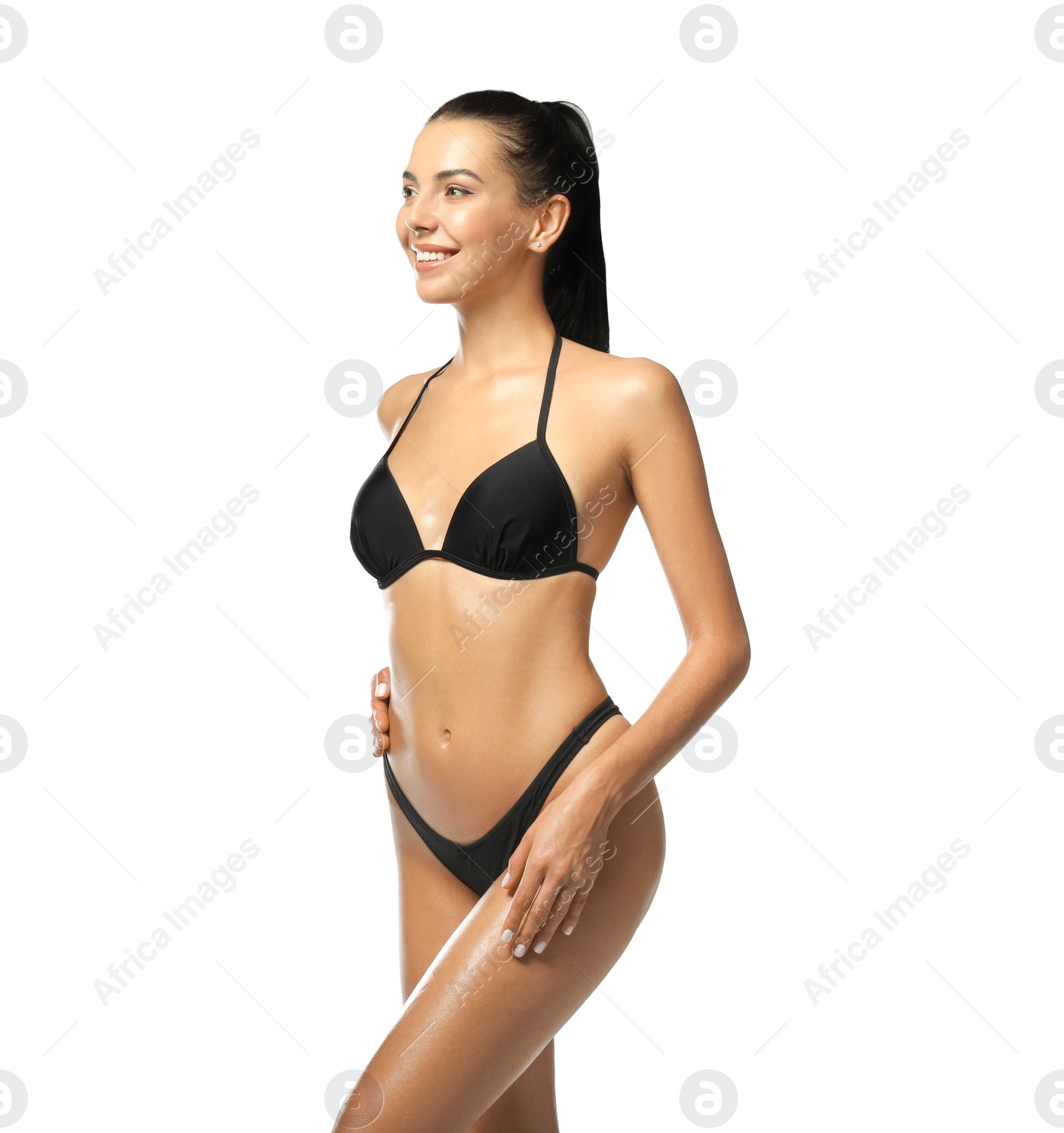 Photo of Sexy young woman in stylish swimsuit isolated on white. Beach body goal