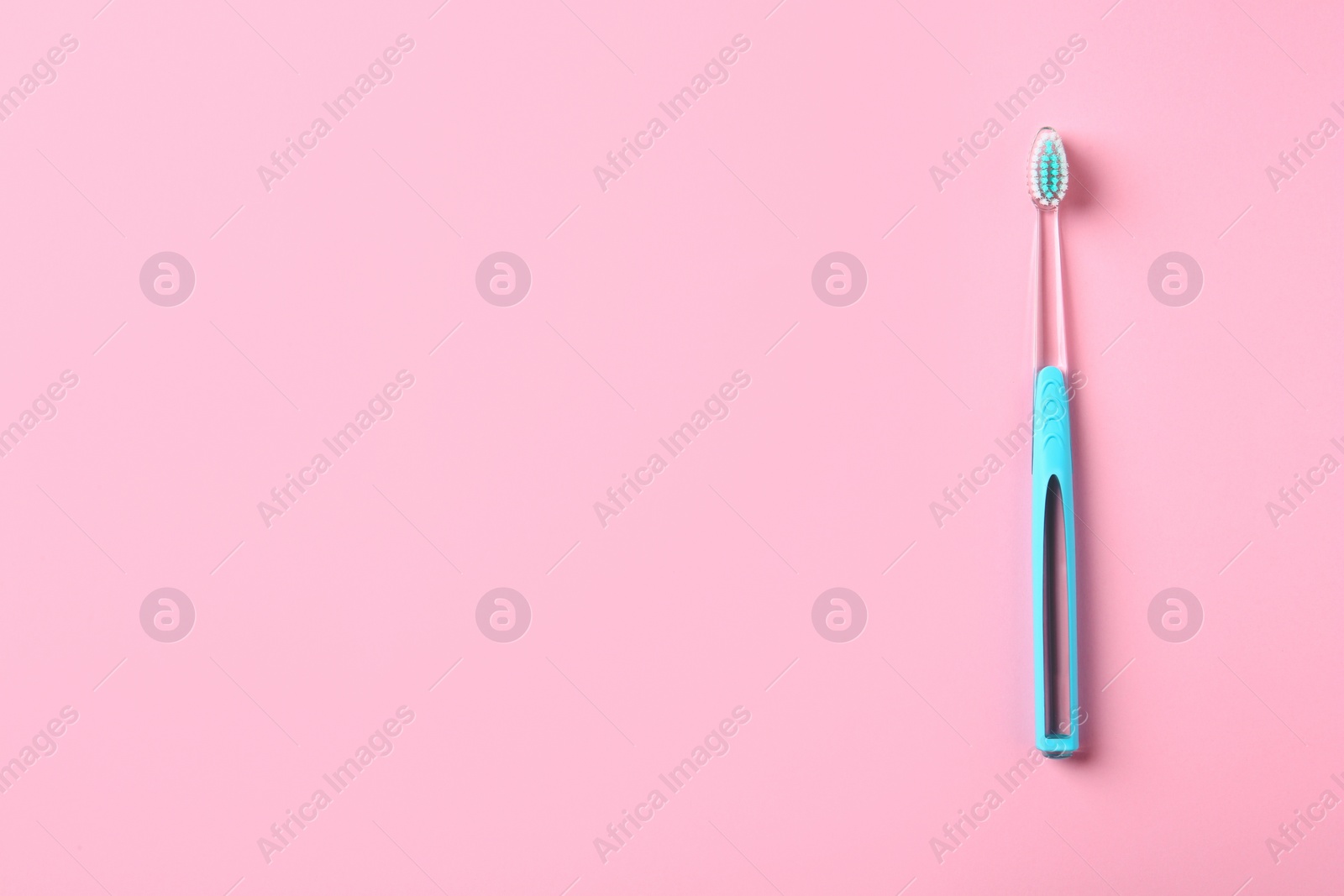 Photo of Manual toothbrush on color background. Dental care