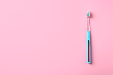 Photo of Manual toothbrush on color background. Dental care