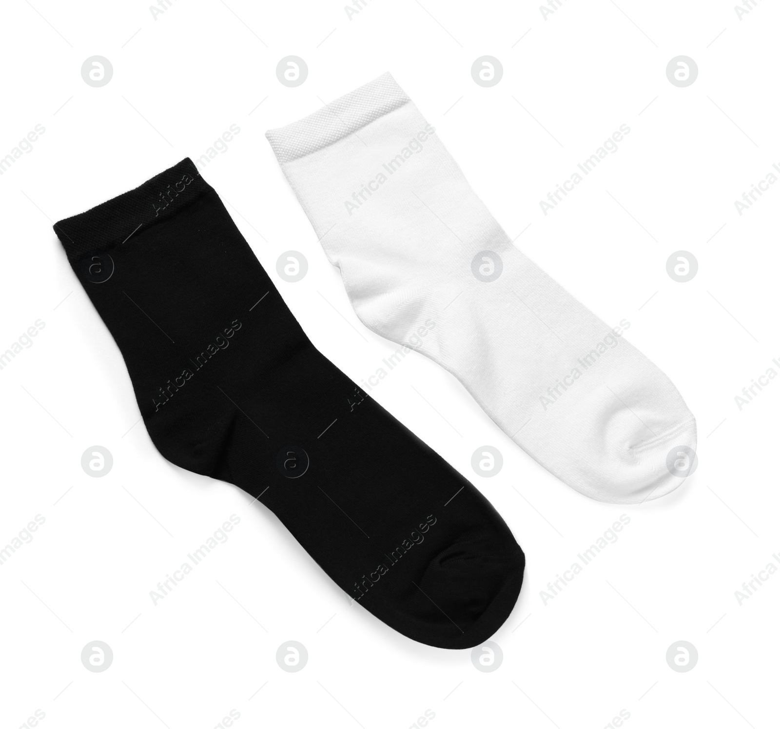 Photo of Different socks isolated on white, top view