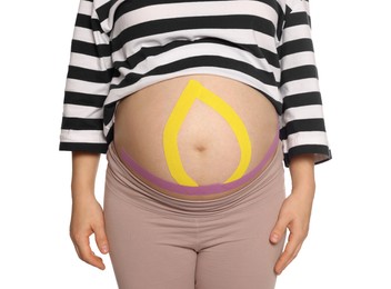 Pregnant woman with kinesio tapes on her belly against white background, closeup