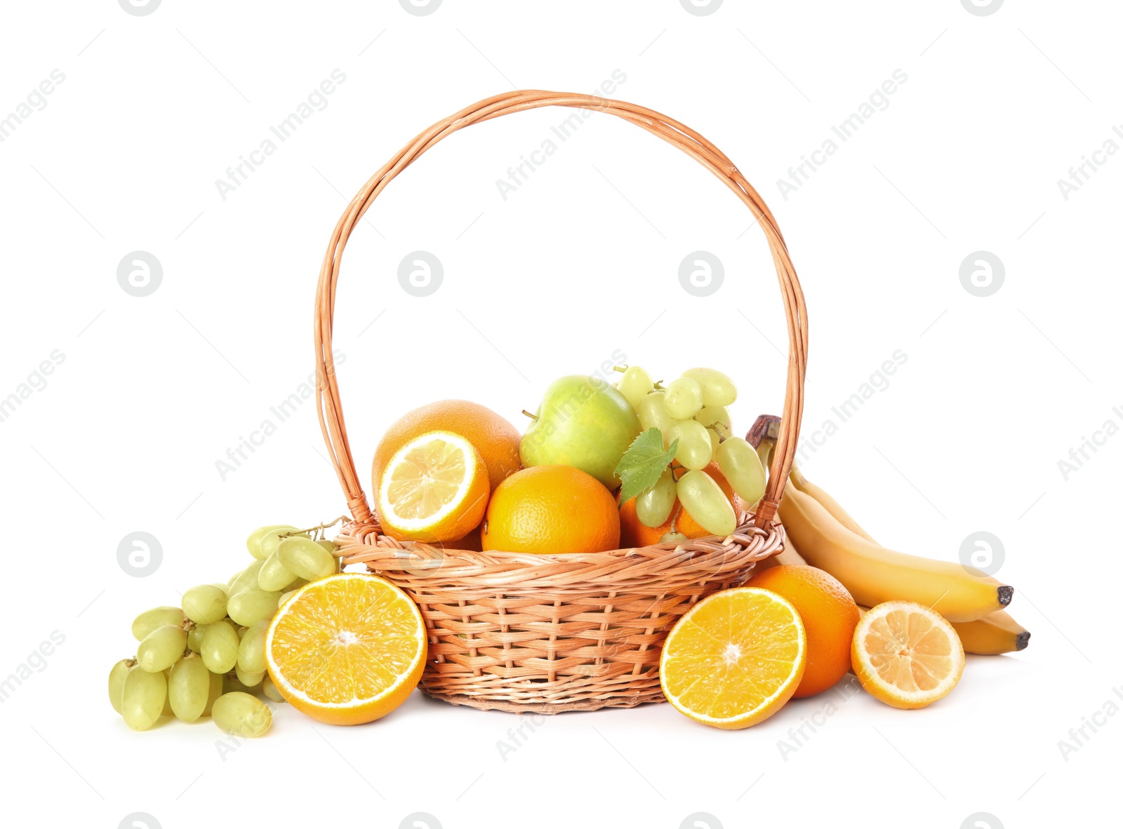 Photo of Wicker basket with different fruits on white background