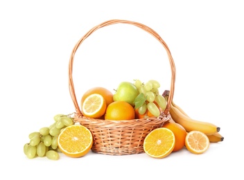 Wicker basket with different fruits on white background