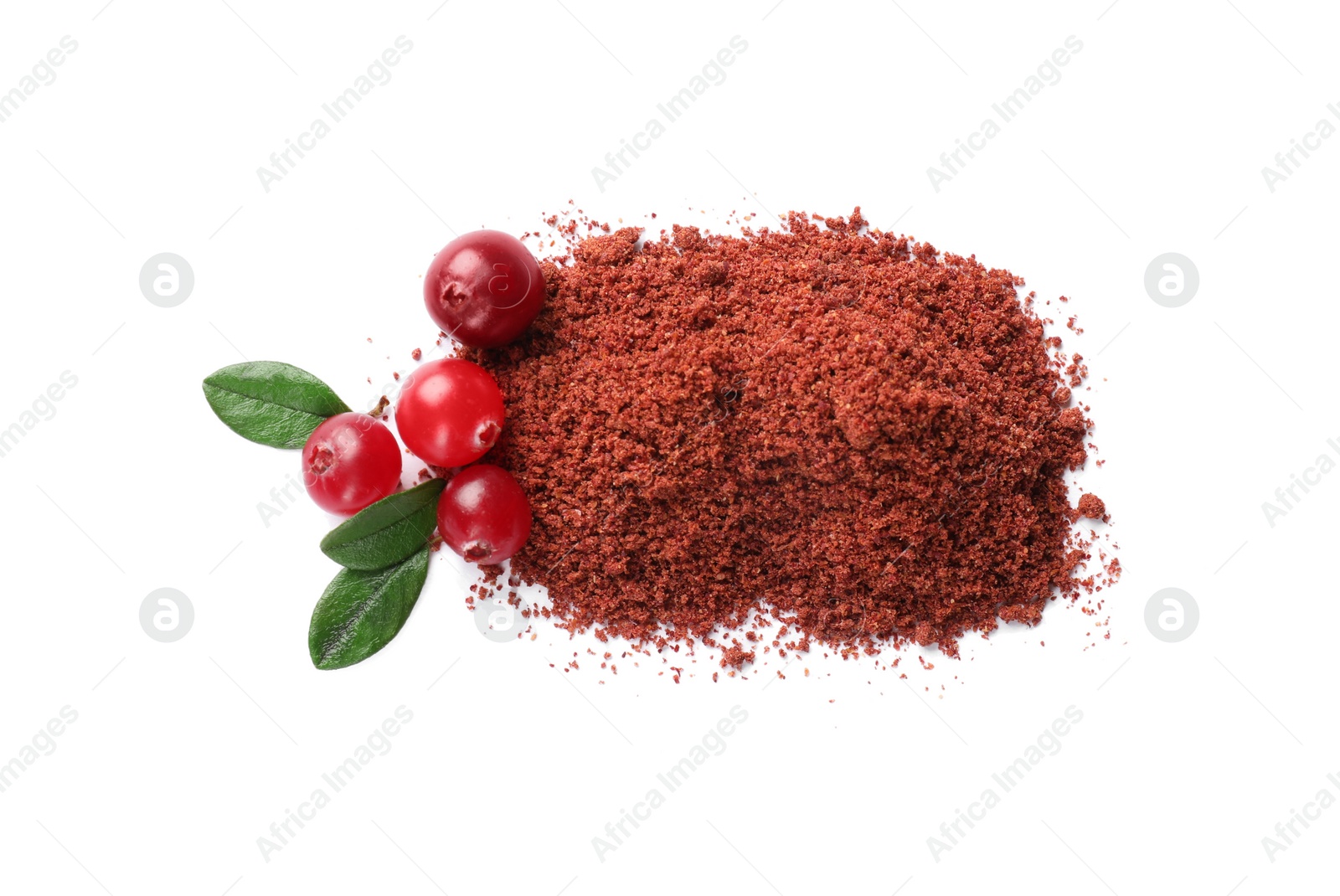 Photo of Dried cranberry powder, fresh berries and green leaves isolated on white, top view