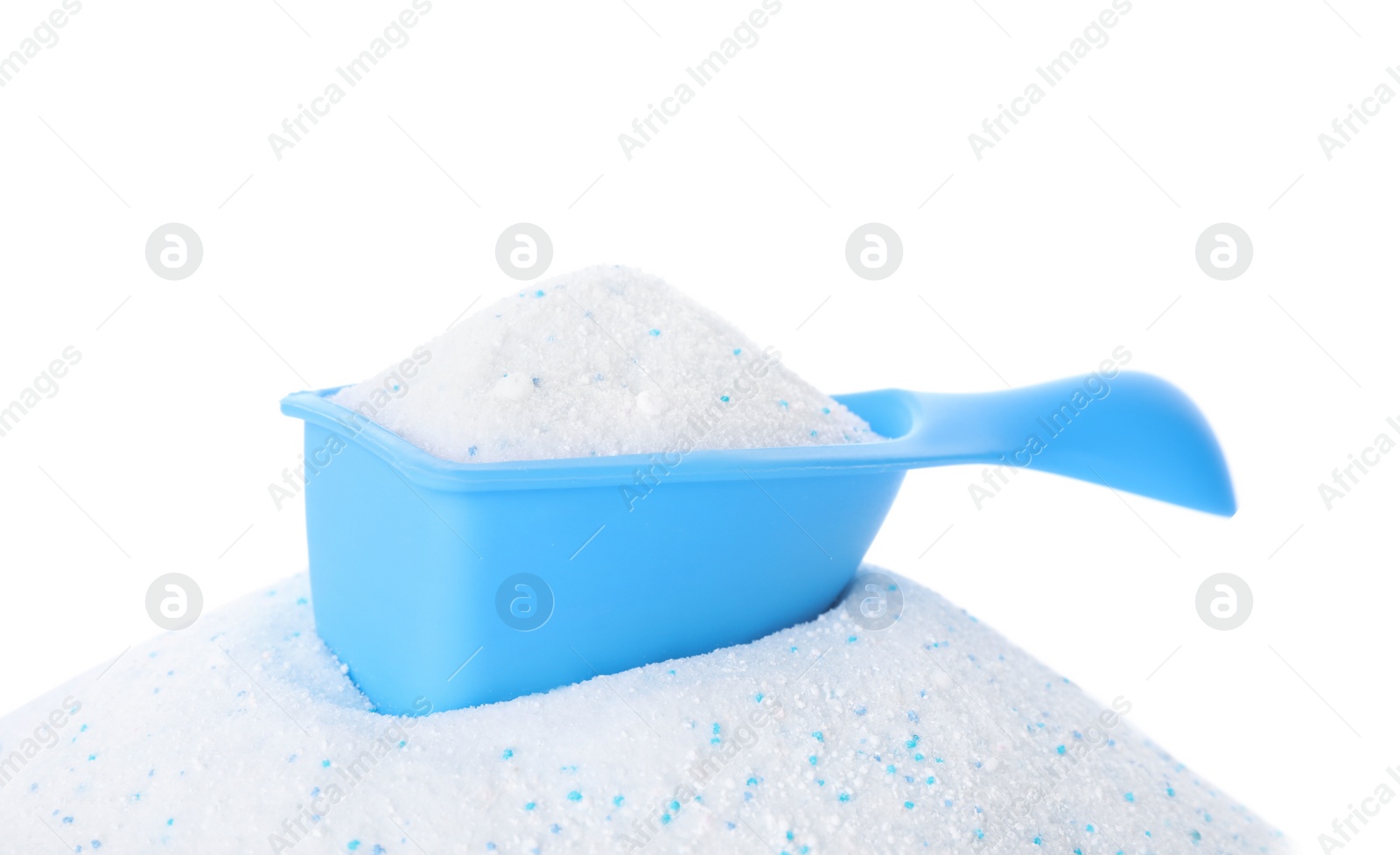 Photo of Measuring scoop with laundry detergent on white background