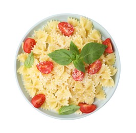 Photo of Tasty pasta with tomato, cheese and basil isolated on white, top view