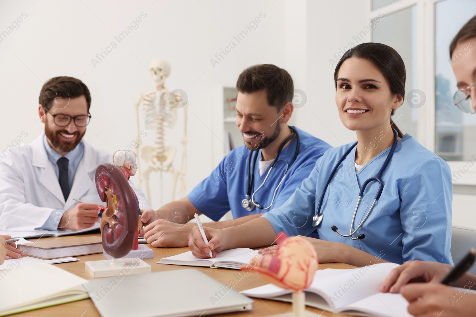 Photo of Happy interns and doctor on lecture in university