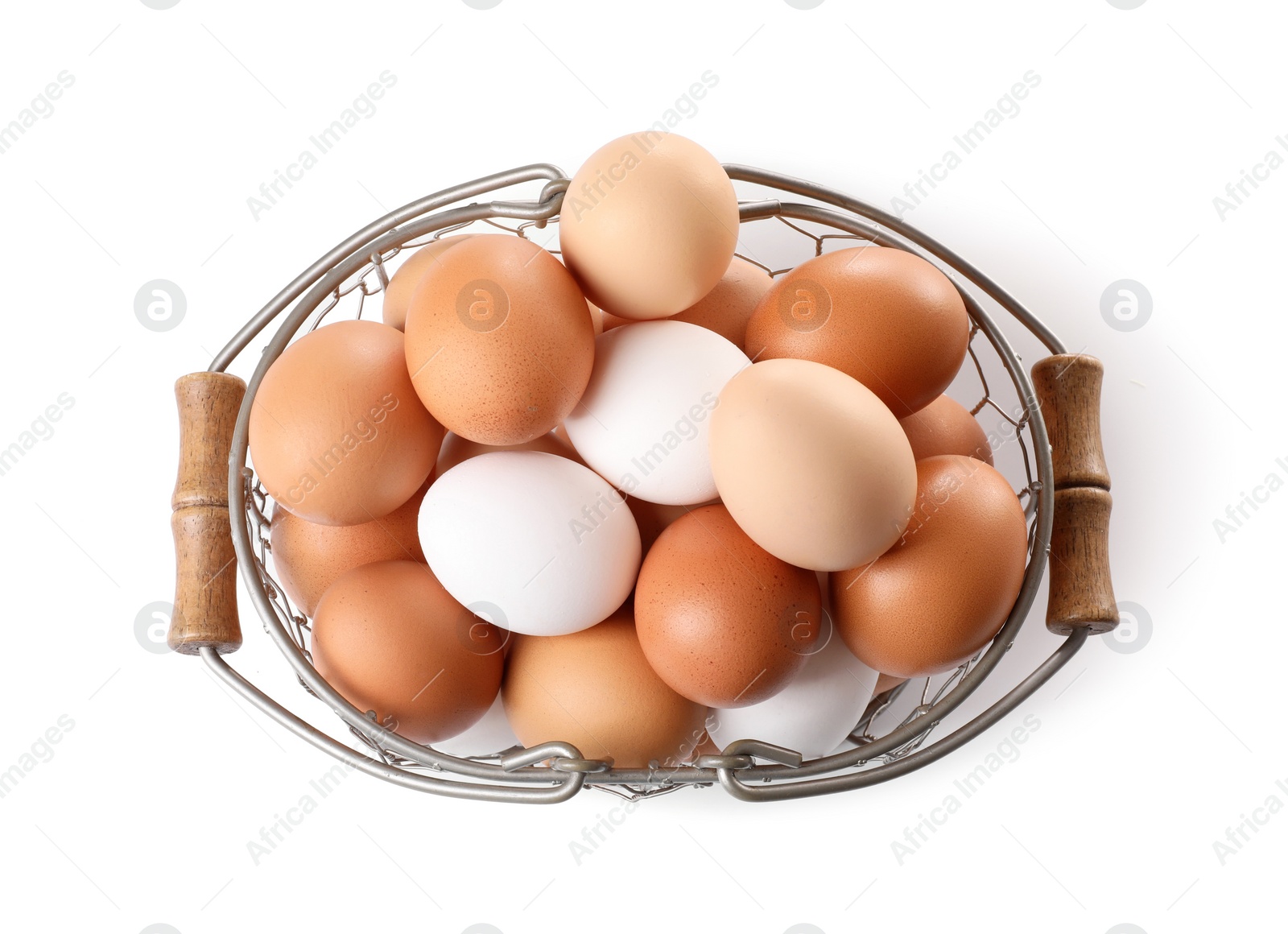 Photo of Fresh chicken eggs in metal basket isolated on white, top view