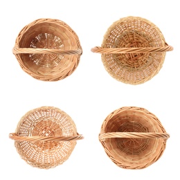 Set with wicker baskets on white background, top view