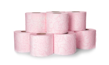 Photo of Color toilet paper rolls on white background