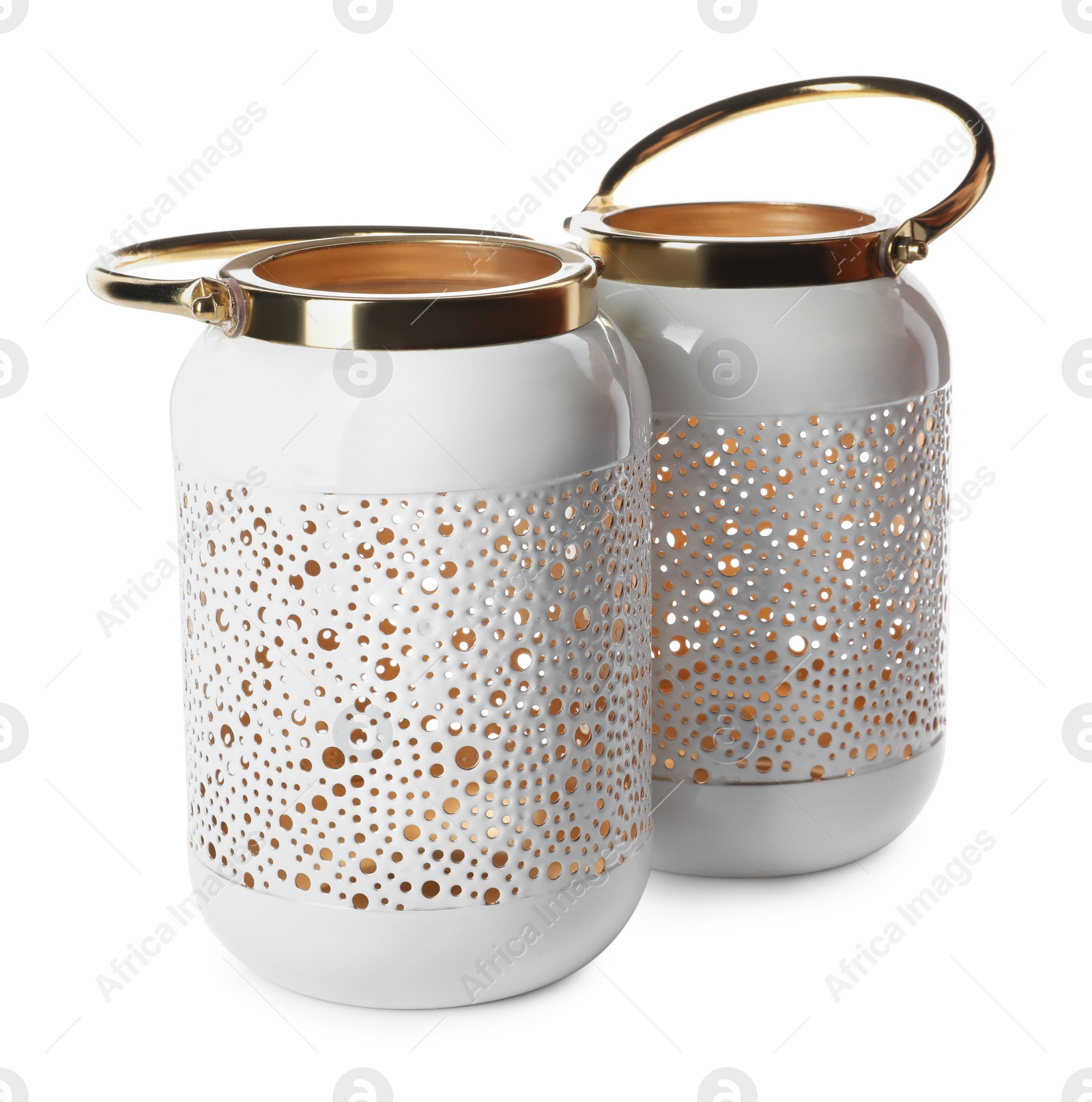 Photo of Stylish gold candle holders on white background