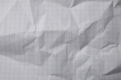 Photo of Crumpled sheet of paper as background, top view