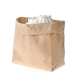 Photo of Organic flour in paper bag isolated on white