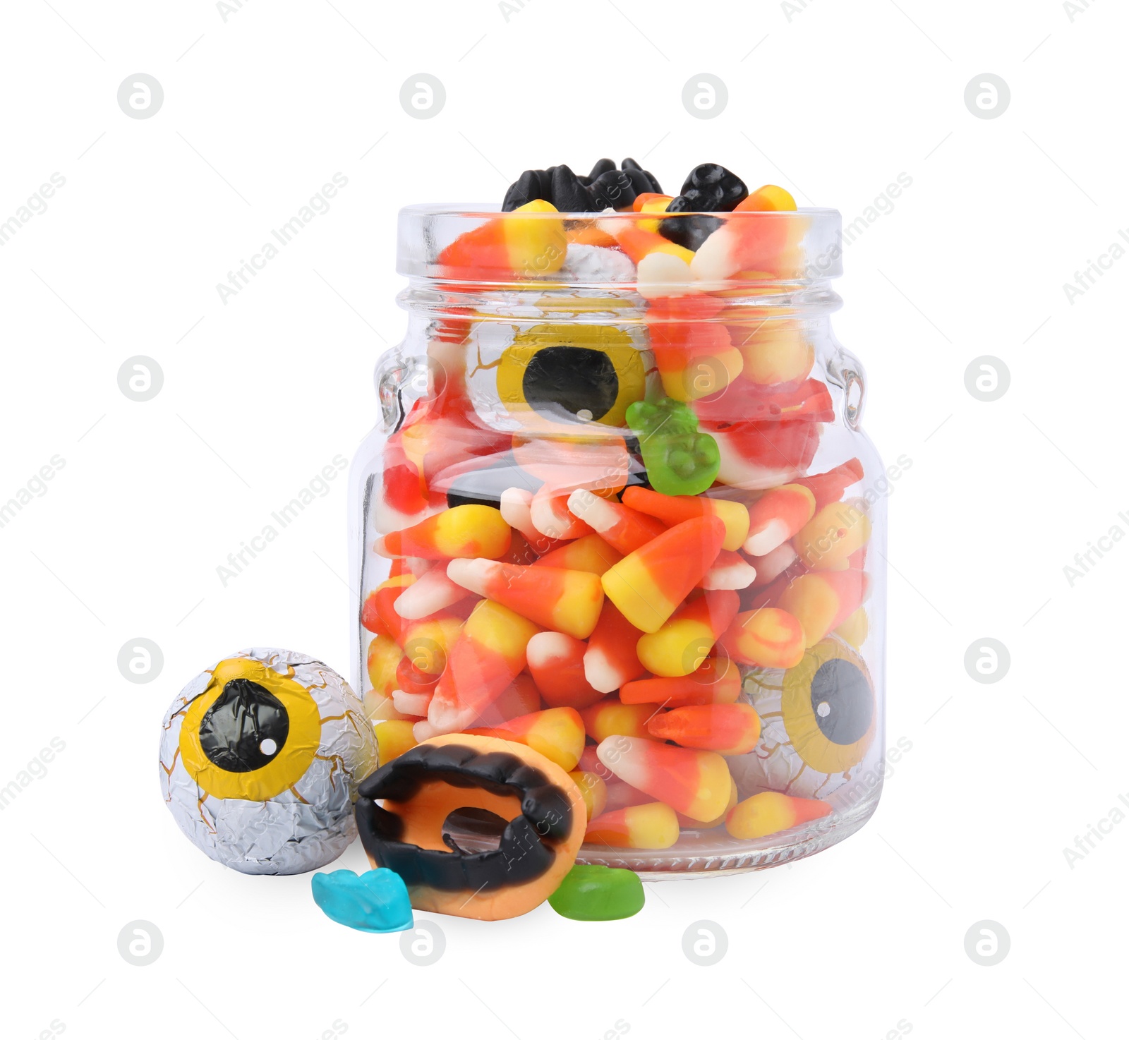 Photo of Jar of delicious colorful candies isolated on white. Halloween sweets