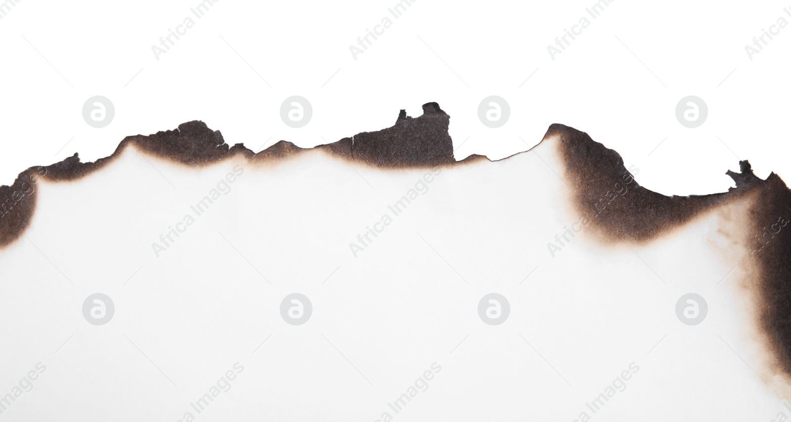 Photo of Piece of paper with dark burnt borders on white background, top view. Space for text