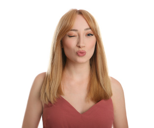 Portrait of beautiful young woman with blonde hair on white background