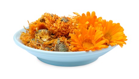 Photo of Plate with dry and fresh calendula flowers on white background