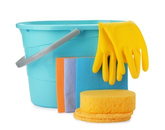 Photo of Light blue plastic bucket and cleaning tools on white background