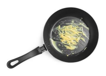 Dirty non-stick frying pan on white background