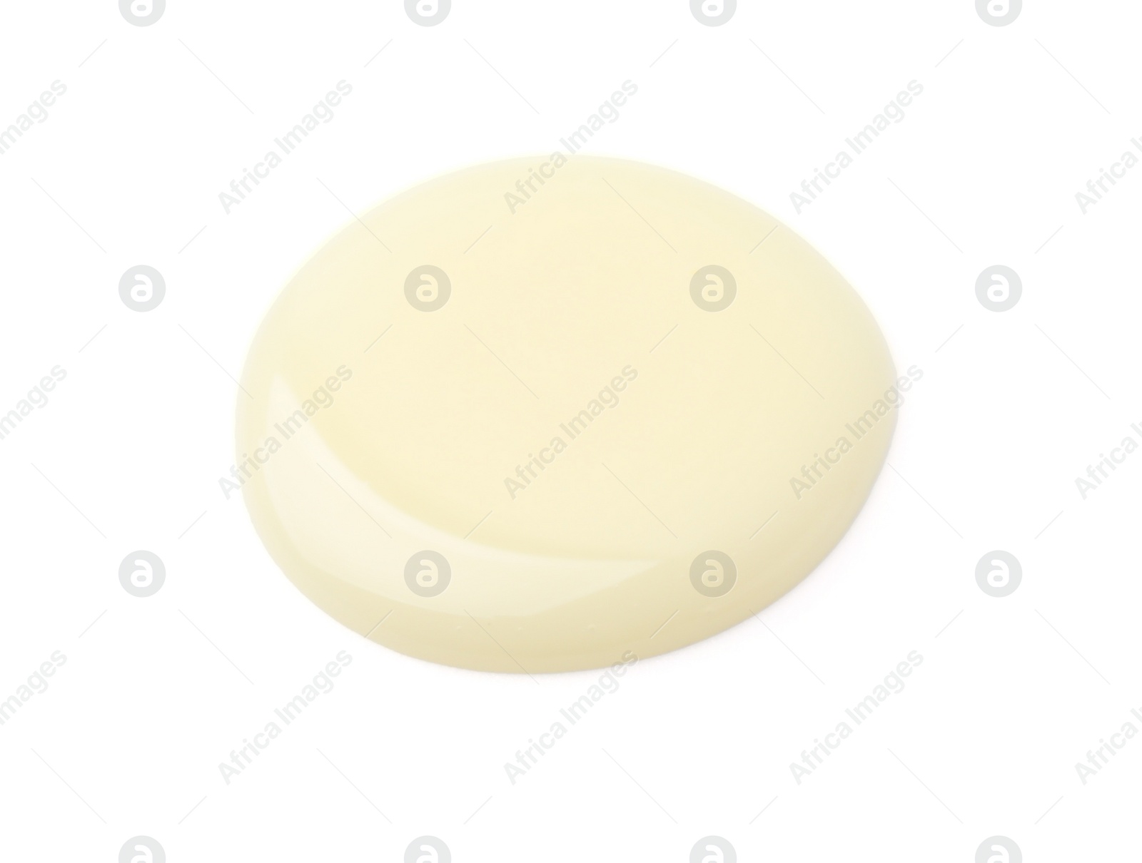 Photo of Drop of condensed milk isolated on white