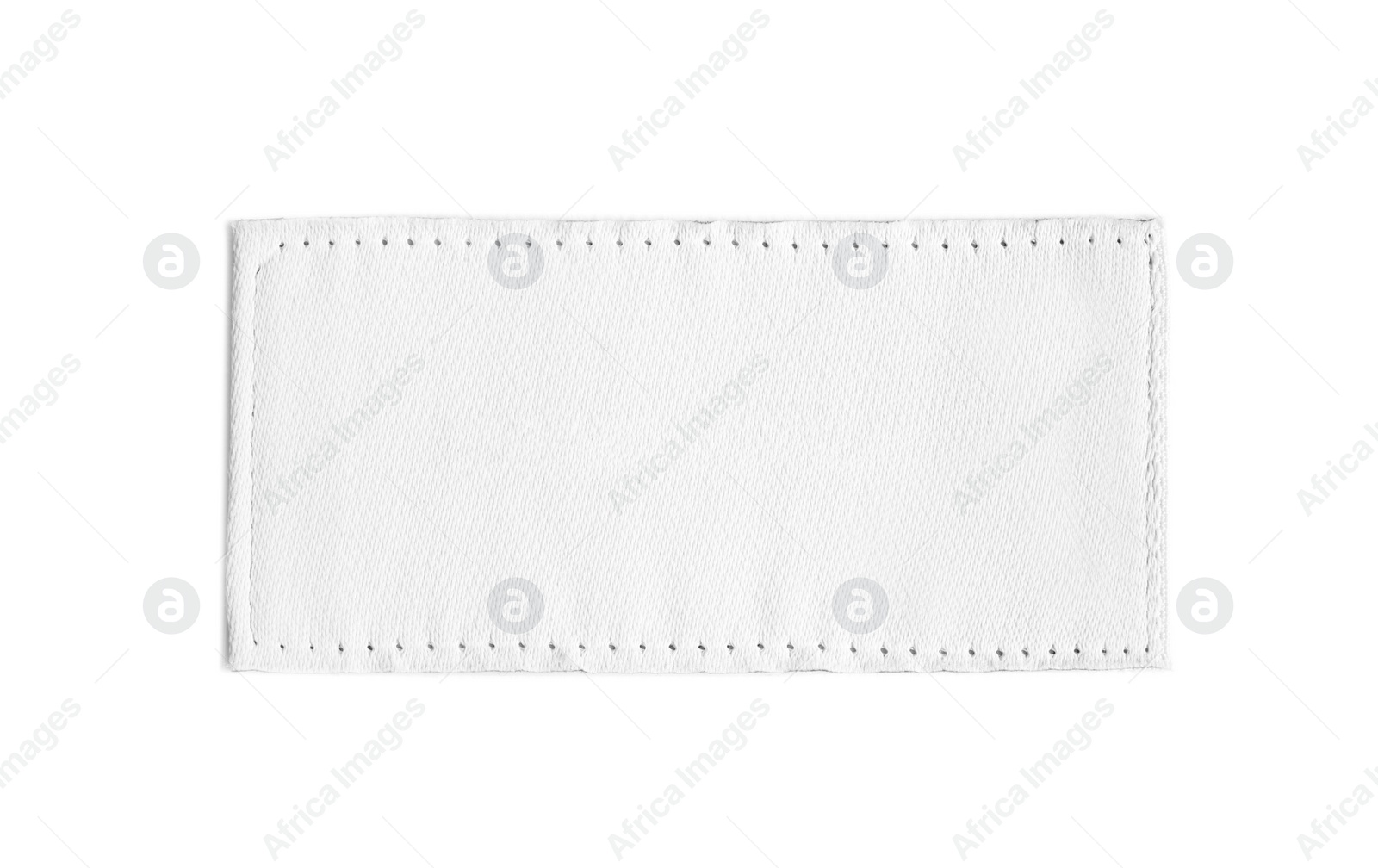 Photo of Blank clothing label isolated on white, top view