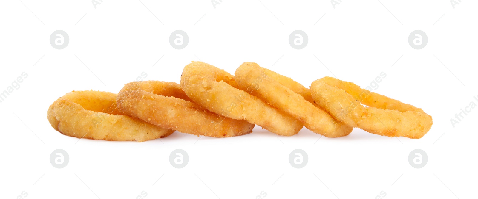 Photo of Delicious golden onion rings isolated on white