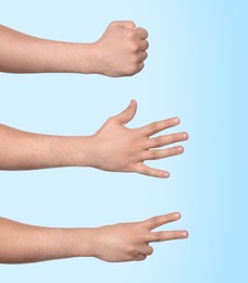 Image of People playing rock, paper and scissors on light blue background, closeup