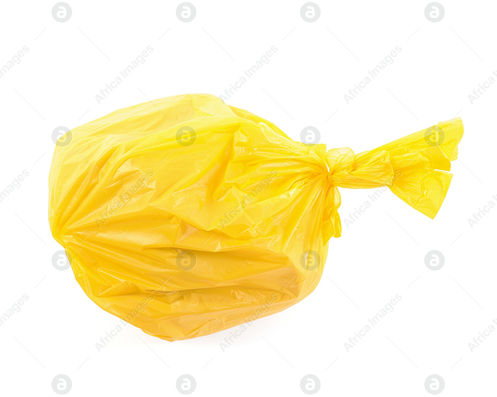 Photo of Yellow plastic garbage bag isolated on white