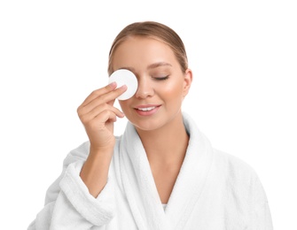 Photo of Beautiful young woman with cotton pad on white background