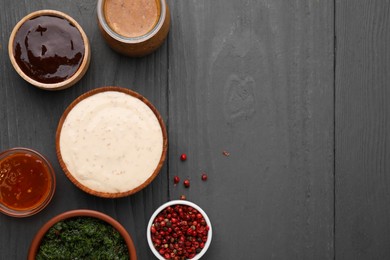 Photo of Different fresh marinades on grey wooden table, flat lay. Space for text