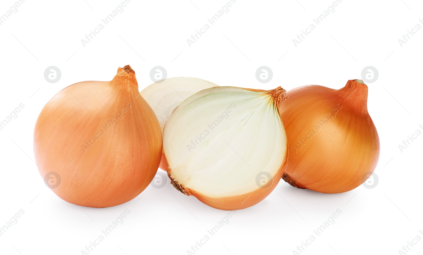 Photo of Whole and cut onions on white background