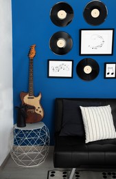 Living room decorated with vinyl records. Interior design