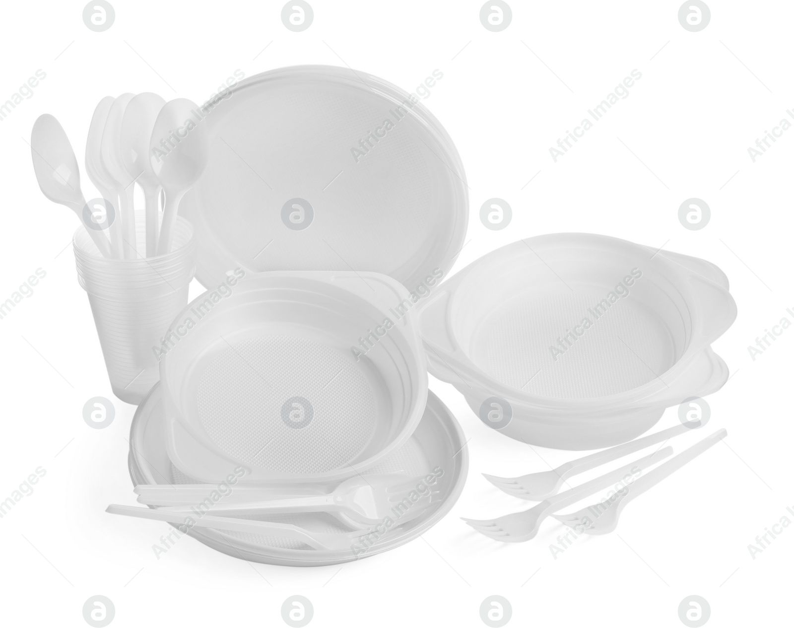 Photo of Set of disposable tableware on white background