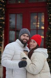 Lovely couple spending time together on city street