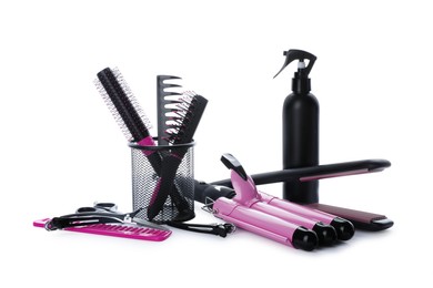 Photo of Different professional hairdresser tools on white background